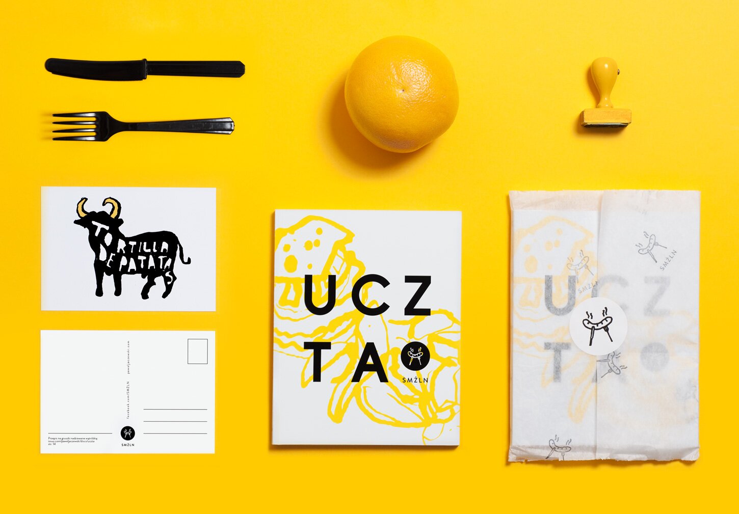 A photography of postcards and UCZTA cookbook